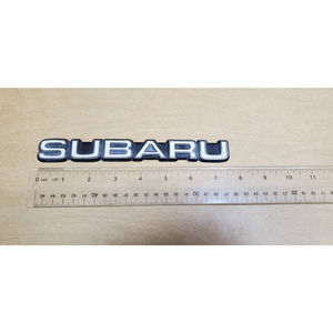 7" Subaru OEM Emblem White Silver Vintage Item Shows Wear